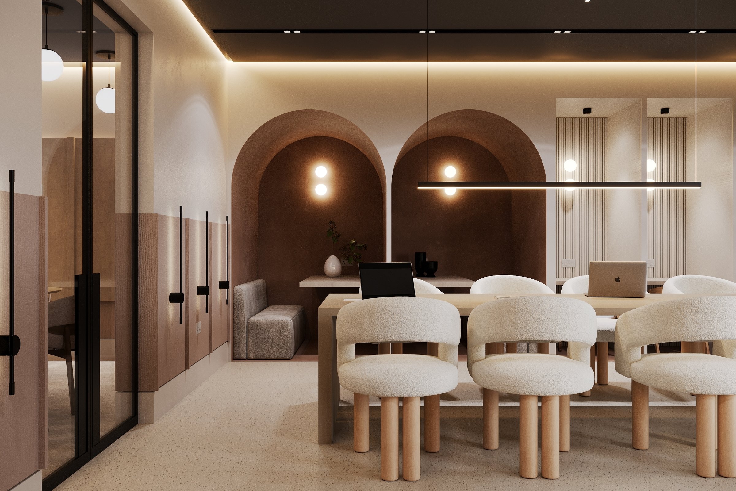 Keslake co-working space with warm lighting and contemporary furnishings — BTR co-living design by Ademchic