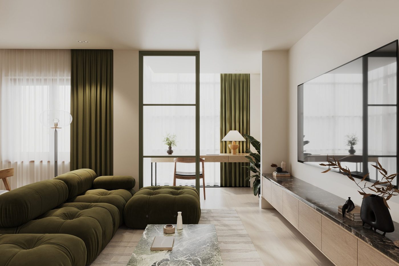 Angel Village living room with green velvet sofa and media wall