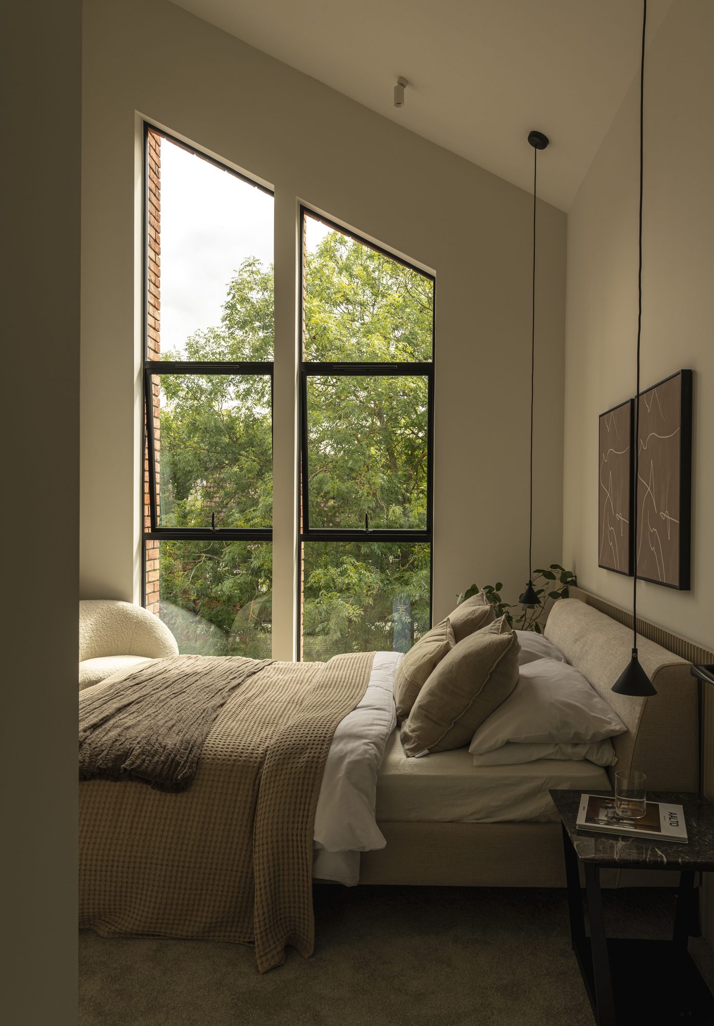 Ivy Gardens bedroom — generous glazing with tree-lined views