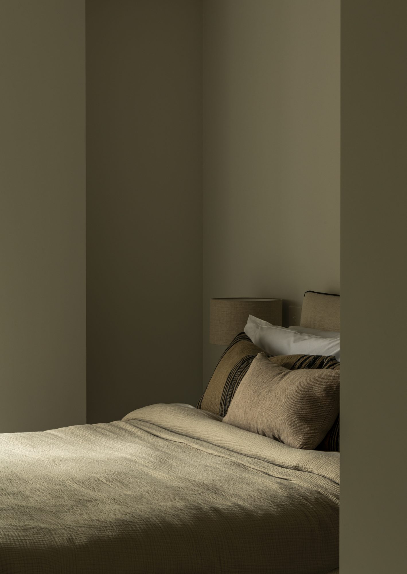 Ivy Gardens bedroom — layered textiles and considered material palette