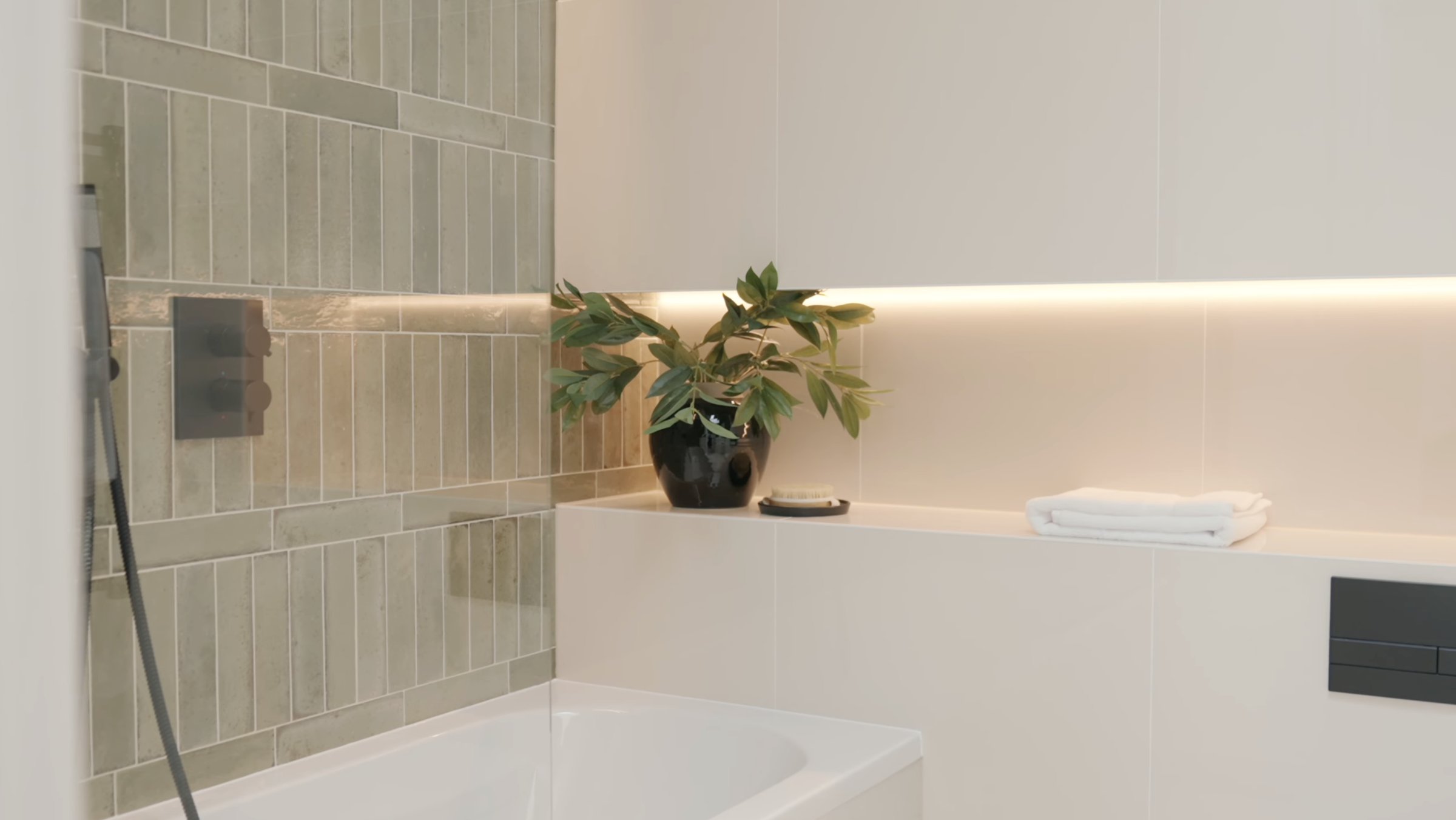 Montpelier-Mews-bathroom with glazed tiles and freestanding bathtub — interior design by Ademchic